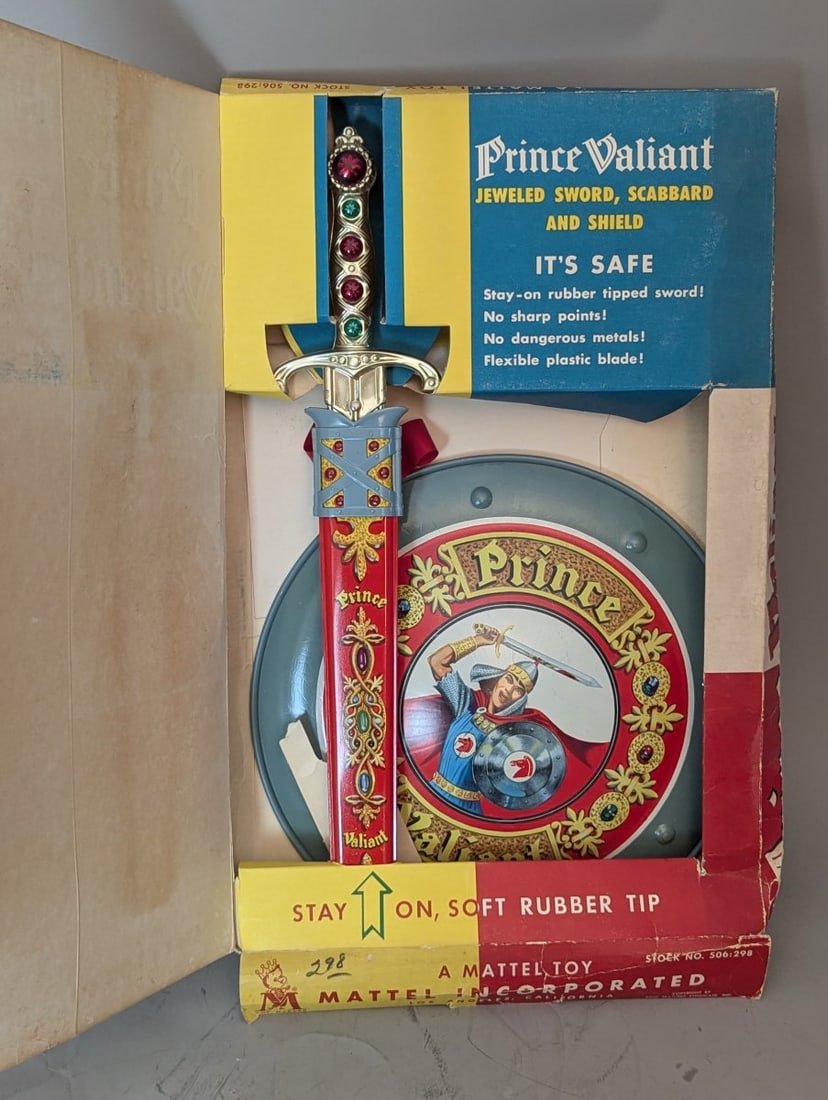 Vintage Mattel Prince Valiant Jeweled Sword Scabbard Shield Set Collectible Toy: **Important** Please read below description on how to avoid high shipping costs. Don't miss this incredible Vintage Mattel Prince Valiant Jeweled Sword, Scabbard, and Shield Set (No. 506), a true