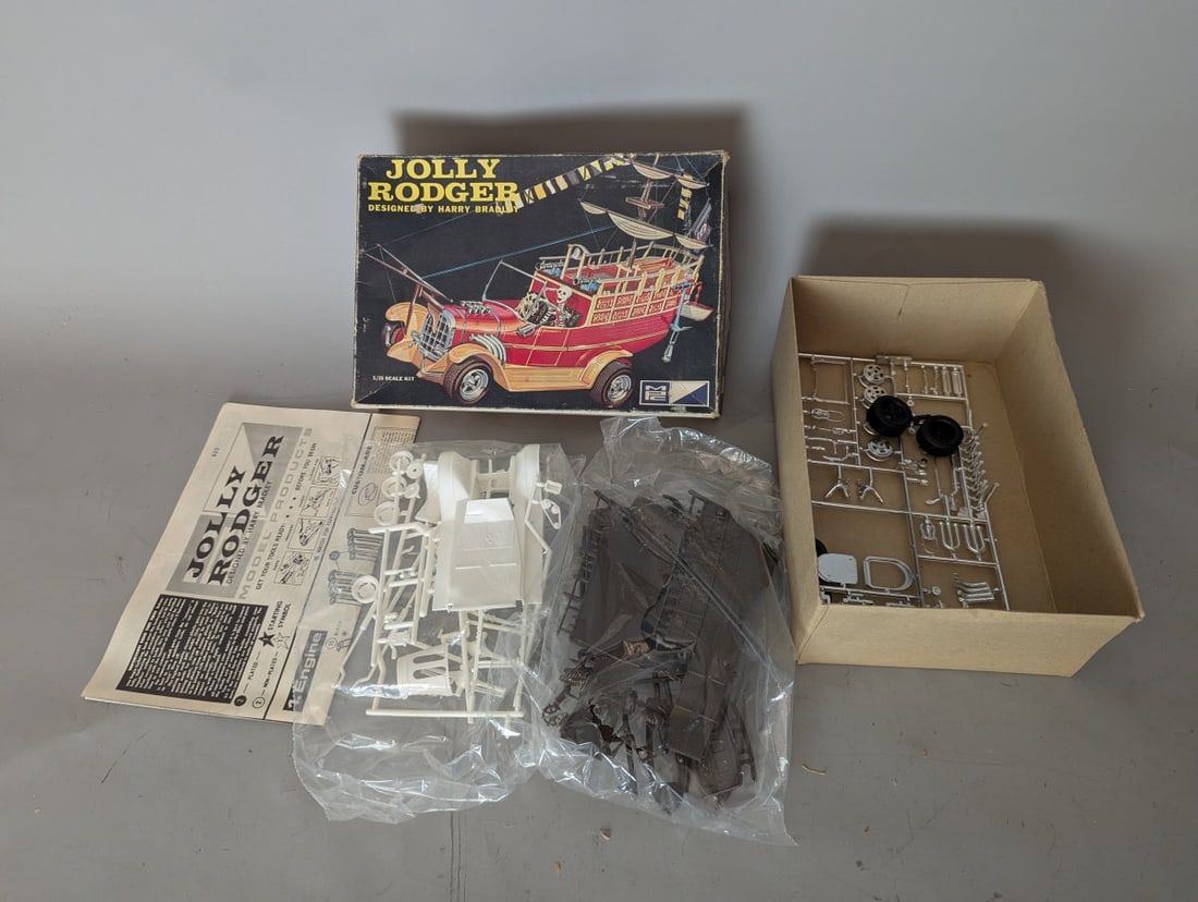 MPC Jolly Rodger Model Kit 1/25 Scale Harry Bradley Vintage Unbuilt Collectible: **Important** Please read below description on how to avoid high shipping costs. Discover this vintage MPC Jolly Rodger 1/25 Scale model kit! A true piece of 'Kustom Kulture' history, this 'New old