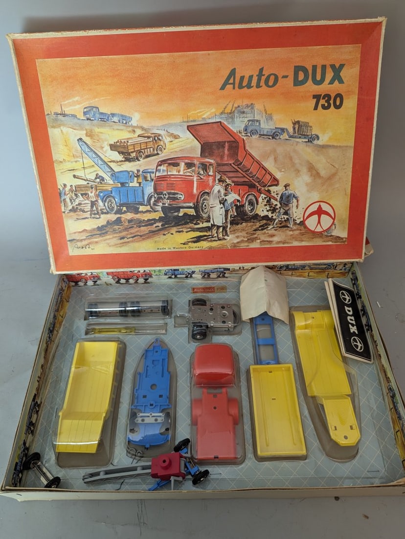 Vintage Auto-DUX 730 Construction Truck Set German Toy New Old Stock Collector's Item: **Important** Please read below description on how to avoid high shipping costs. Up for auction is a remarkable Auto-DUX 730 Construction Truck Set housed in a 16 x 11 x 2 box. This treasure is "New