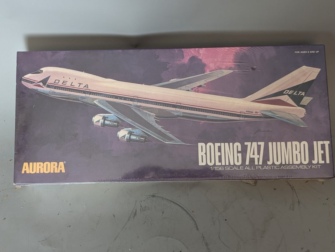 Aurora Delta Airlines Boeing 747 Jumbo Jet 1/156 Scale Model Kit Vintage NOS Sealed: **Important** Please read below description on how to avoid high shipping costs. Presenting a rare Aurora Delta Boeing 747 Jumbo Jet Model Kit in 1/156 scale, measuring 18 x 2 1/2 x 8. This item is