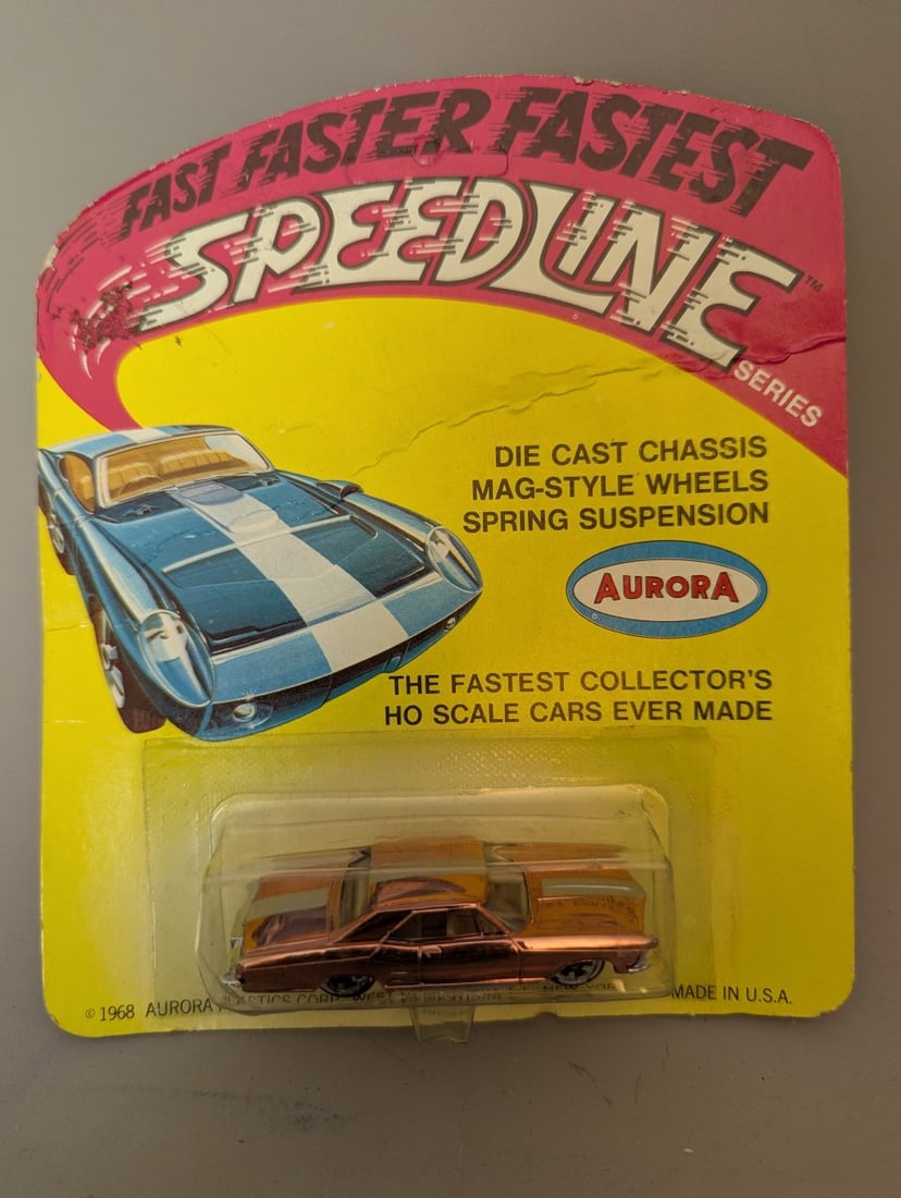 1968 Aurora Speedline Buick Riviera Die-Cast Car NOS Metallic Copper Collectible Toy: **Important** Please read below description on how to avoid high shipping costs. Introducing the 1968 Aurora Speedline Buick Riviera Die-Cast Car (#6809), a remarkable new old stock item measuring 5 3