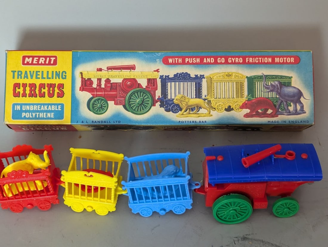Merit Travelling Circus Friction Toy Set Cat. No. 7865 Vintage Toy J & L Randall Ltd: **Important** Please read below description on how to avoid high shipping costs. Discover this delightful Merit 'Travelling Circus' Friction Toy Set (Cat. No. 7865), measuring 11 x 2 3/4 x 2, in 'New
