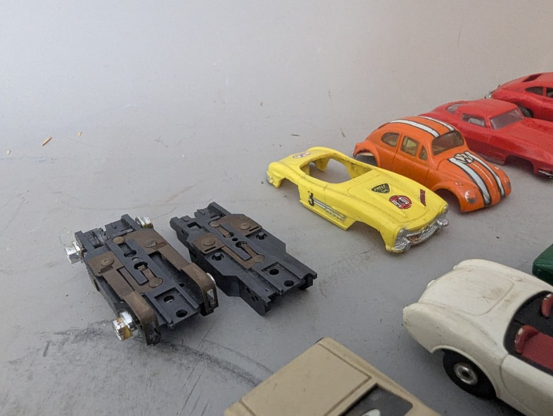 Vintage HO Scale Slot Car Collection with Chassis, Bodies, and Parts for Restoration - 7
