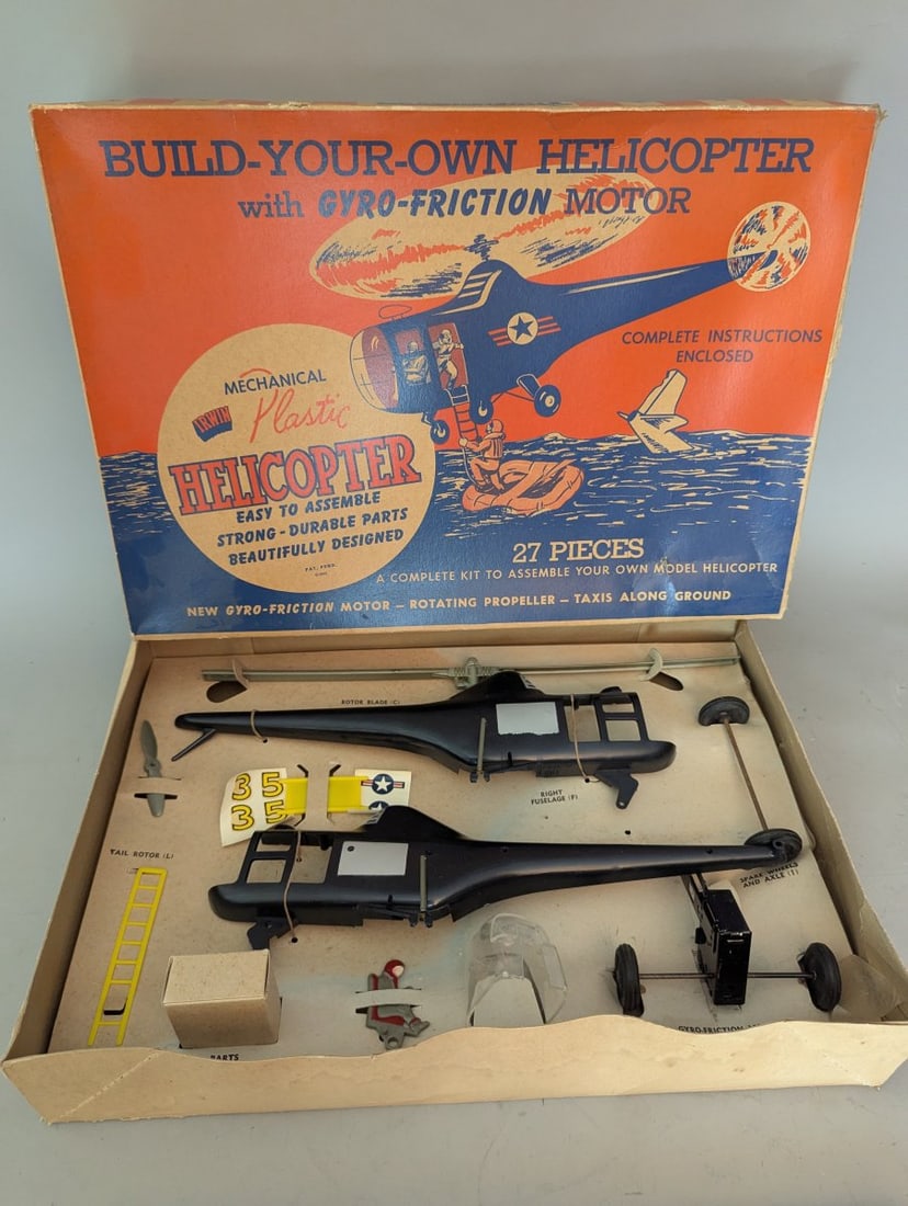Irwin Build Your Own Helicopter Model Kit with Gyro-Friction Motor Vintage Collectible: **Important** Please read below description on how to avoid high shipping costs. Introducing a rare find for collectors: the Irwin Build-Your-Own Helicopter Model Kit with Gyro-Friction Motor! This