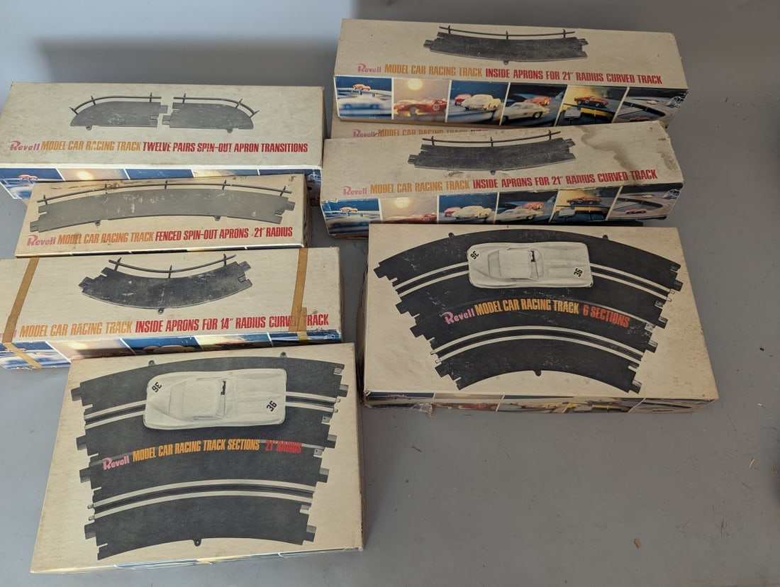 Vintage Revell Model Car Racing Track Collection 1/32 Scale Accessories 1960s: **Important** Please read below description on how to avoid high shipping costs. Discover a vintage collection of Revell 1/32 scale model car racing track and accessories from the mid-1960s. This lot 