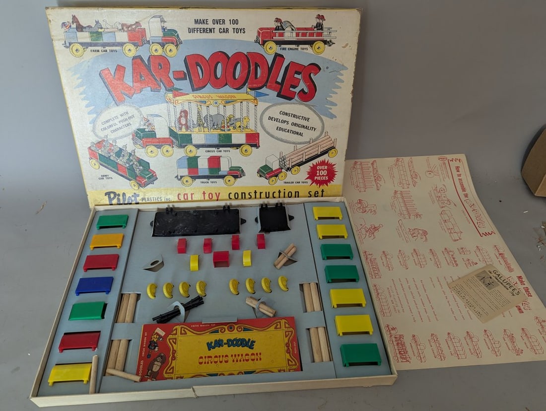 Kar-Doodles Car Toy Construction Set by Pilot Plastics Inc. Vintage Unpunched: **Important** Please read below description on how to avoid high shipping costs. Discover this New Old Stock Kar-Doodles Car Toy Construction Set, measuring 19 x 13 x 1 1/2. This exceptional set,
