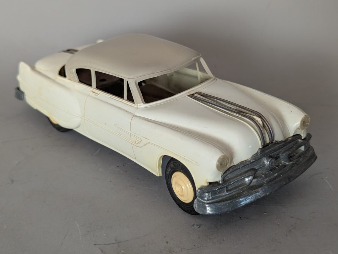 Vintage 1950 Pontiac Chieftain Promotional Friction Toy Car by AMT Ford AMT Collectible: **Important** Please read below description on how to avoid high shipping costs. Up for auction is a Vintage 1950 Pontiac Chieftain Promotional Friction Toy Car, measuring 7 1/2 x 3 x 2 1/2 inches.