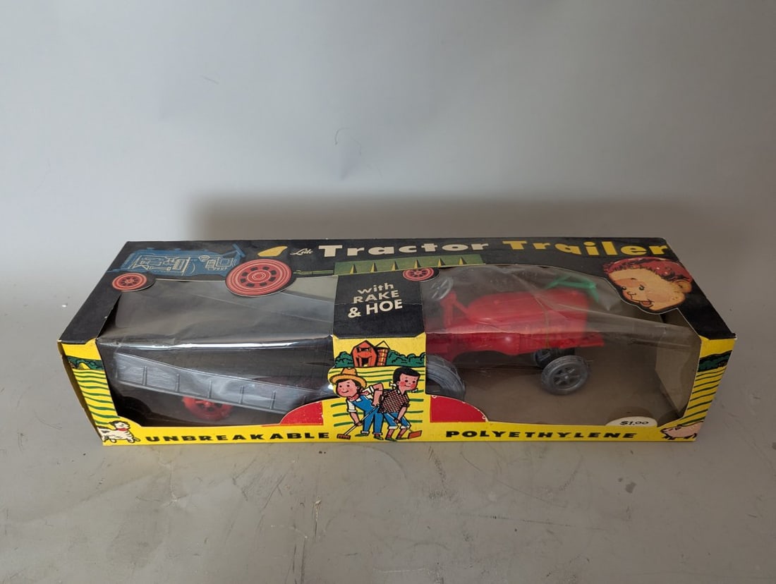 Vintage Lido Tractor Trailer with Rake & Hoe Toy Set No. 1793 New Old Stock: **Important** Please read below description on how to avoid high shipping costs. Up for auction is a Lido Tractor Trailer with Rake & Hoe Toy Set (No. 1793), measuring 19 x 5 1/2 x 4 1/2. This item