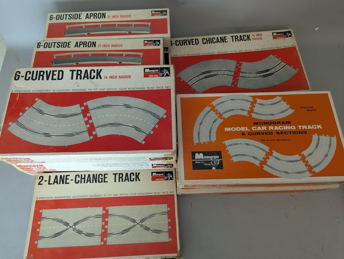 Monogram NOS Slot Car Track Lot with Various Types from the 1960s for Collectors and Hobbyists: **Important** Please read below description on how to avoid high shipping costs. Up for auction is an incredible collection of 11 boxes of New Old Stock (NOS) Monogram Model Car Racing slot car track