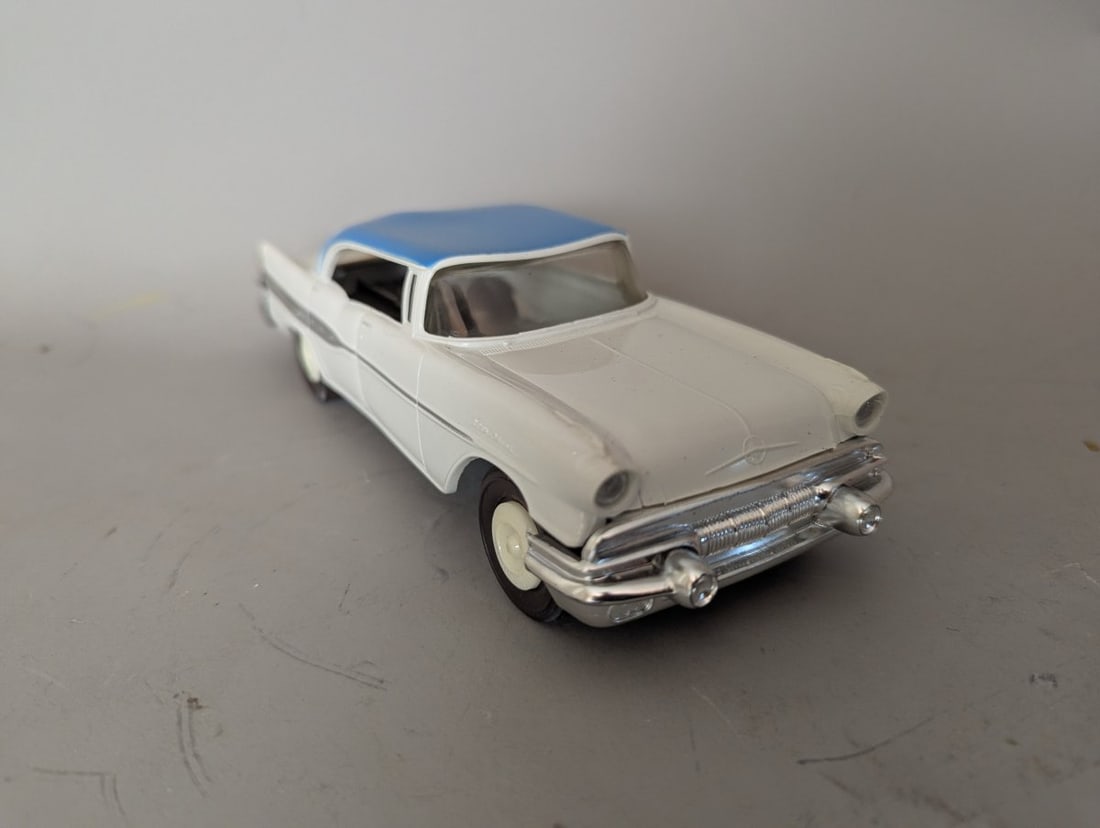 Vintage 1957 Pontiac Star Chief Promotional Model Car by SMP Collectible Toy: **Important** Please read below description on how to avoid high shipping costs. Up for auction is a Vintage 1957 Pontiac Star Chief Promotional Model Car by S.M.P. Measuring 8 x 3 x 2 1/2 inches,