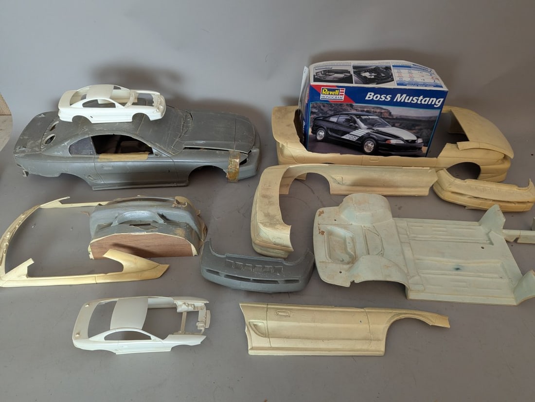 Revell Monogram Boss Mustang 1/25 Scale Model Kit Production Molds and Parts Collection: **Important** Please read below description on how to avoid high shipping costs. Explore a rare opportunity to own original production molds and parts for the Revell Monogram 1/25 scale Boss Mustang.