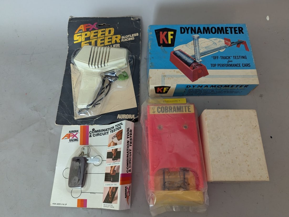 Assorted Vintage Slot Car Accessories Lot Including KF Dynamometer and Tools: **Important** Please read below description on how to avoid high shipping costs. This auction features an exciting collection of assorted slot car accessories, all in Al new old stock condition.