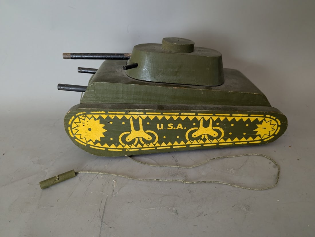 Vintage ND Cass Wooden Pull Toy Tank Military Collectible Unique Broken Cannon: **Important** Please read below description on how to avoid high shipping costs. This vintage N.D. Cass wooden pull toy tank measures 7 x 14 x 6 inches. Please note that one cannon is broken off, leav