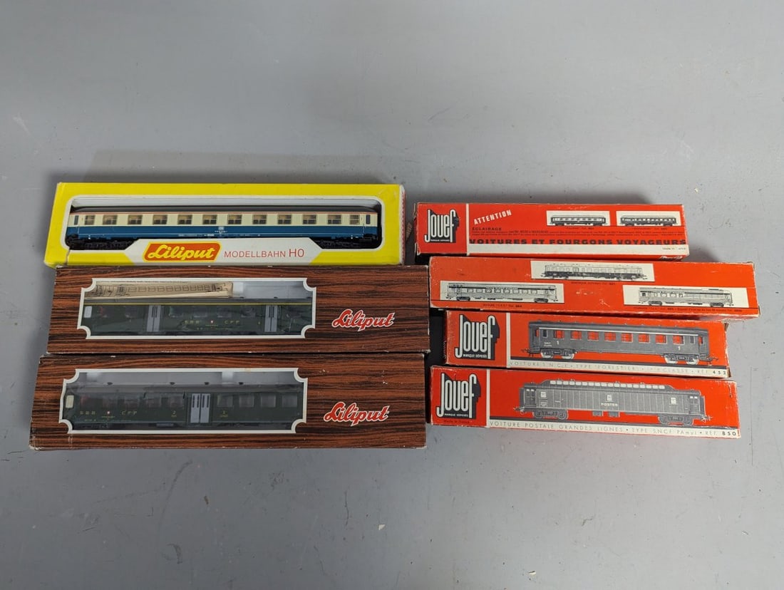 Unique HO Scale Model Train Lot - Liliput and Jouef Passenger Cars in Original Boxes: **Important** Please read below description on how to avoid high shipping costs. Presenting a fantastic collection of seven HO scale model railway cars from esteemed European manufacturers Liliput