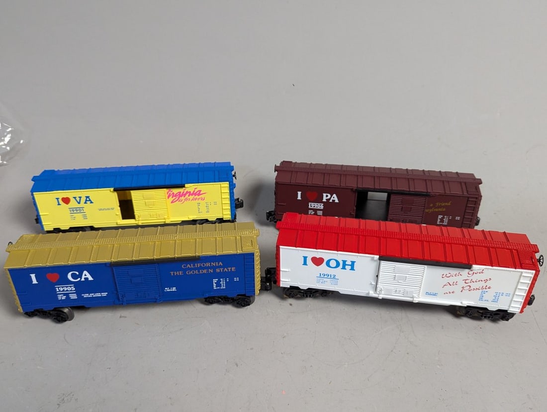 Lionel O-Gauge I Love Boxcar Collection from 1990s - Pennsylvania Virginia California Ohio: **Important** Please read below description on how to avoid high shipping costs. Up for auction is a fantastic collection of four Lionel O-Gauge model train boxcars from the iconic 'I Love...' series,