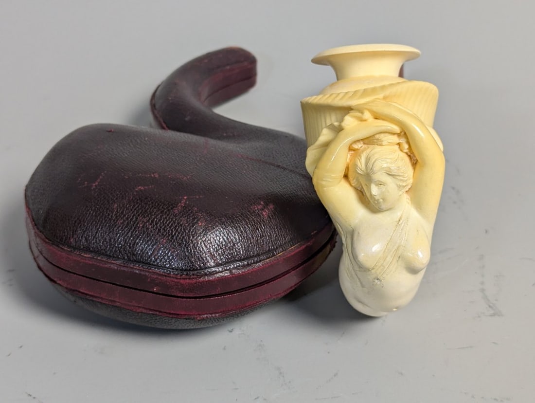 Art Nouveau Style Carved Meerschaum Pipe with Fitted Case for Collectors: **Important** Please read below description on how to avoid high shipping costs. Step into the world of collectible artistry with this exquisite Art Nouveau style carved meerschaum pipe. Measuring 7