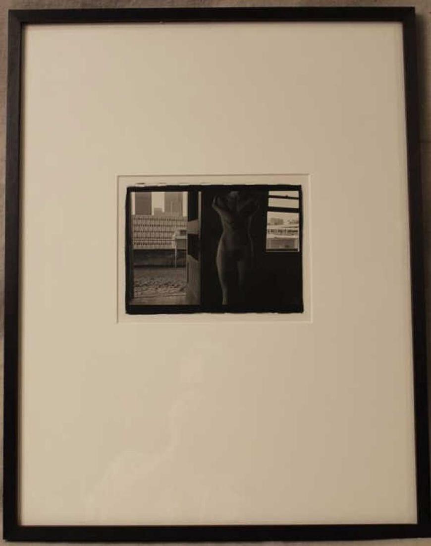 Joel W. Rogers (Wa.) B/W Photograph Female Nude: Image of female nude in abandoned room with view of downtown Seattle. Mat with black stained wood gallery frame. 5.75" x 7.75" mat opening; 20.75" x 16.25" frame.
