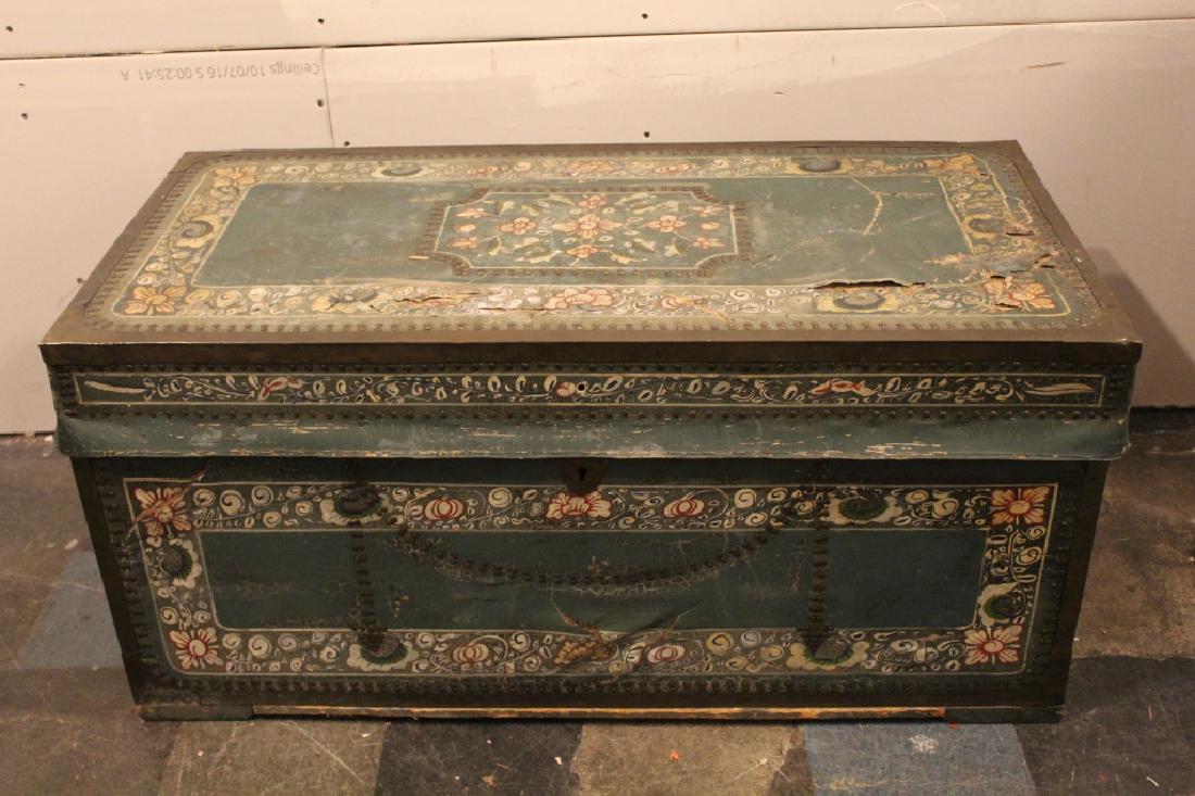 Antique English Camphor Wood and Leather Trunk: Camphor wood covered in thin leather or parchment with hand painted floral design. Brass and nailhead trim. Side handles (lifting knob to lid missing). Good original condition with some surface tears,