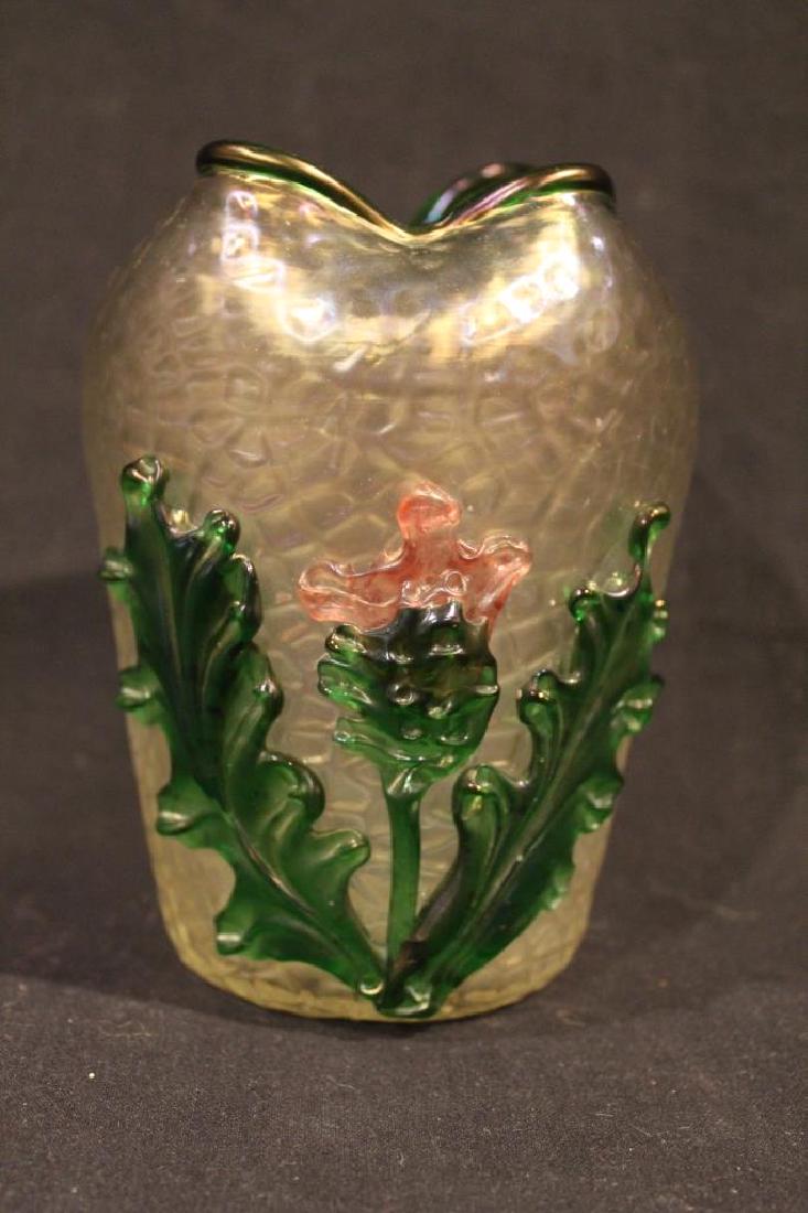 Antique Art Nouveau Loetz Style Art Glass Vase: Hand blown clear glass vase in quilted texture with iridescent finish. Applied thistle decoration and green rim. No apparent mark; possibly Loetz or Kralik. Excellent condition; early 20th C. 5.5 " H