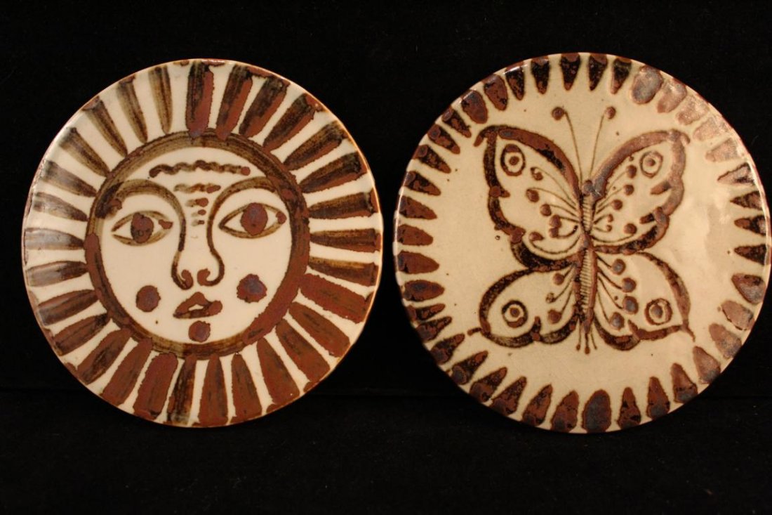 Two Vintage Ken Edwards Mexican Pottery Trivets: Two Ken Edwards Mexican Pottery Trivets (1) Sun design trivet with KE MEXICO and cat face marks, 7.25" dia. (2) Butterfly design trivet with KE MEXICO and bug/beetle marks, 7.5" dia. Excellent conditi