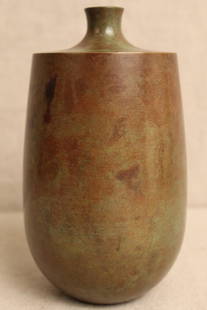 Mid Century Japanese Bronze Ikbana Vase: Unusual bottle shape with small neck. Patinated surface with maker's stamp to bottom. Excellent condition. 7.25" H.