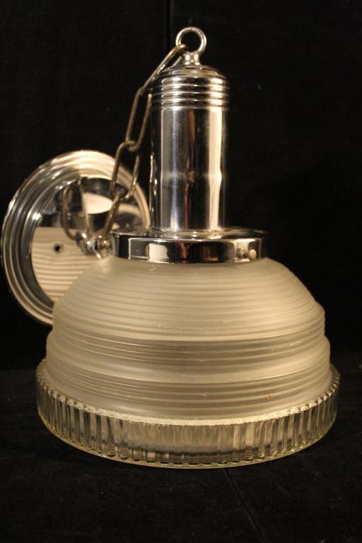 Art Deco Chrome and Glass Pendant Light Fixture: Streamline deco ceiling mount fixture with removable glass shade. Excellent condition. Socket present; no wiring. 5.5" x 9.25" dia. shade; 14" L chrome; 19.5" total length approx.