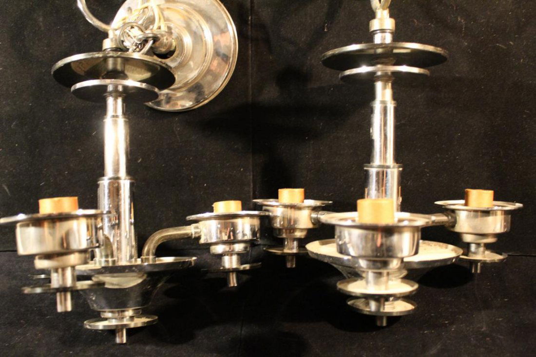 Pair Art Deco Chrome Chandelier Light Fixtures: Matched pair 3 arm deco chrome chandeliers with ceiling mount plates. Good condition with original wiring. 22.5" total length approx. 12" dia. approx.