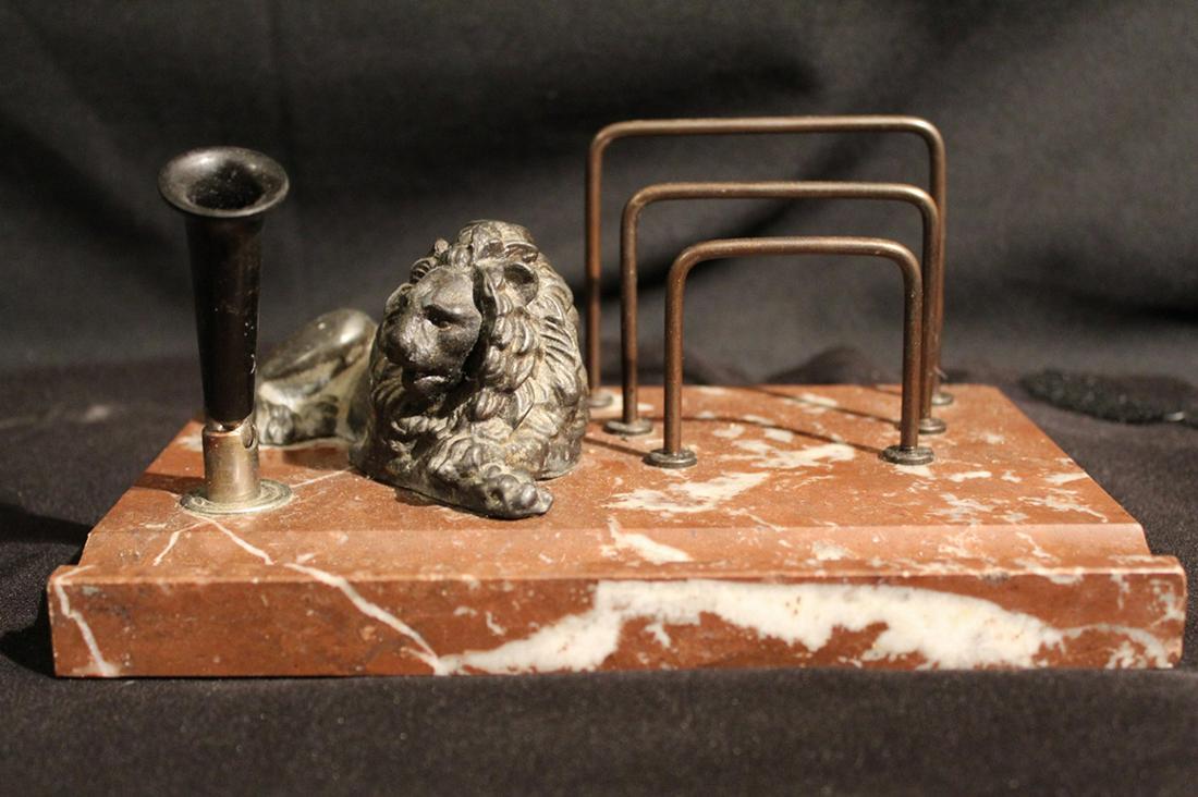 Antique Lion Desk Pen & Letter Holder: Red marble base with cast metal lion statue, letter holder rack, and swivel fountain pen holder. Excellent condition. 8.87" W x 6" D.