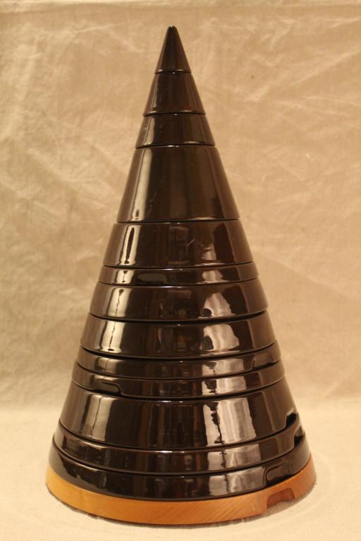 CONO by Ceramica Franco Pozzi for Pierre Cardin: Stacking 14 piece tableware set designed for the Espace Pierre Cardin store in Paris in 1970 by Joe Colombo. Comprised of 13 pieces of ceramic bowls and plates in various sizes and topped by salt and