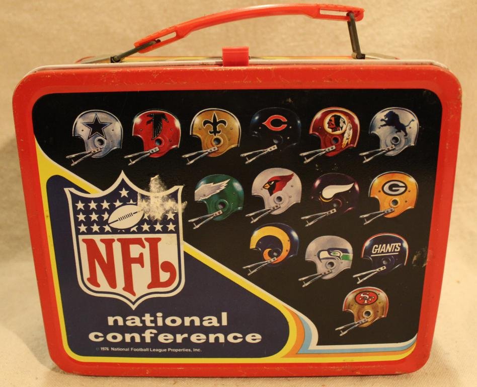 Vintage NFL American Conference Metal Lunch Box: NFL American Conference metal lunch box. In good overall condition with several small dents; some wear to edges and scratches to surface; sticker residue and added paint; NO THERMOS. Dimension approxi