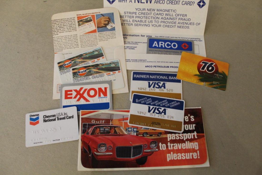 Vintage Mixed Exxon, Visa, Etc. Credit Cards: Mixed lot of 1981 credit cards, including Visa, Exxon, Arco, Gulf, Chevron, and Union 76; original paper holders from Gulf and Arco included. Dimensin per card 2 1/4"W x 3 1/2" L.