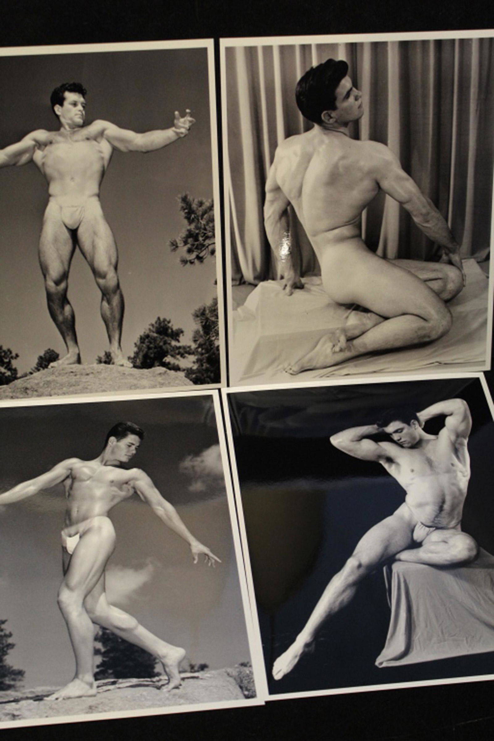 Western Photgraphy Guild Male Nude Photographs: Group of four 8" x 10" official WPG reprints using original Don Whitman 1950's negatives on gloss silver metallic paper. Western Photograpy Guild stamps to reverse of each. Two outdoor photographs (on