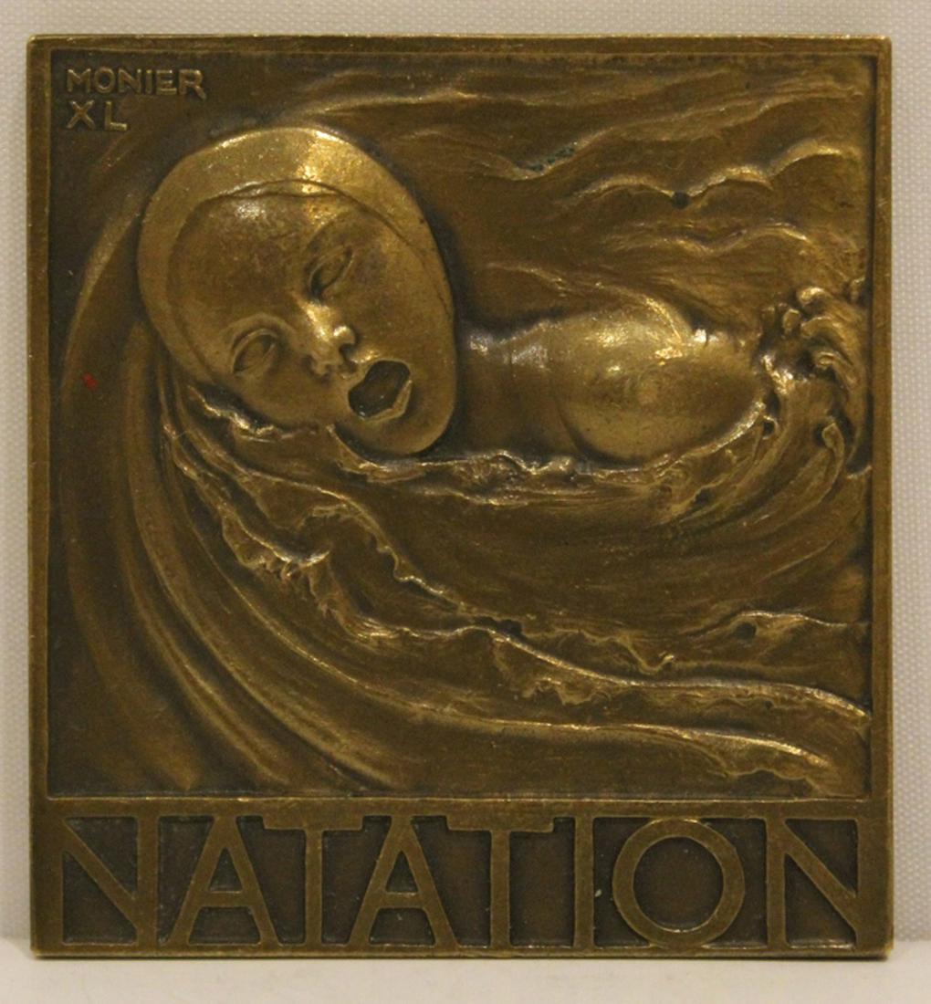 Morlon Monier Bronze Swimming Sport Medal: French Morlon "Natation" swimming medal designed by Emile Monier. Medal is marked "Monier XL" on the front and "Morlon" on reverse. In good condition. Dimension 2"W x 2 1/4"L.