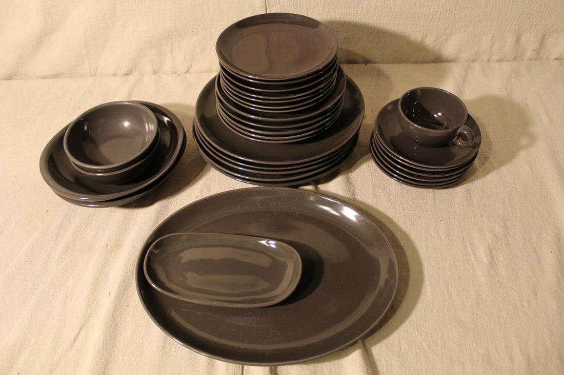 Russel Wright Iroquois Casual Charcoal: Good condition with various signs of use. Includes 5 dinner plates, 5 salad plates, 7 bread plates, 2 bowls, 2 gumbo bowls, 1 butter liner plate, 1 oval platter, 1 cup, 6 saucers.