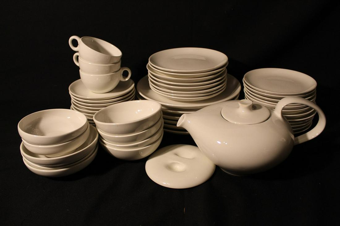 Russel Wright Iroquois Casual White: Good condition with various signs of use. Includes 6 dinner plates, 8 salad plates, 12 bread plates, 3 low bowls, 4 bowls, 2 restyle bowls, 3 cups, 11 saucers, teapot (chips to lid handle), and 1 bowl