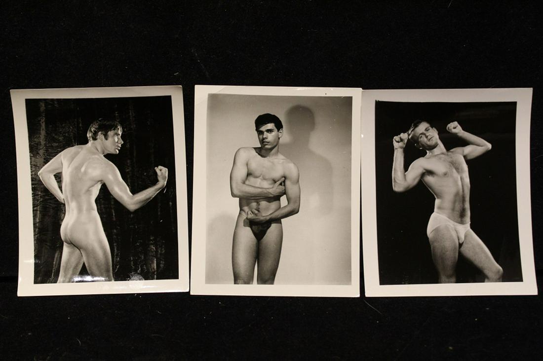 Bob Mizer AMG Male Nude Physique Photos: Group of three vintage photographs with flexing models. Each numbered in pencil to reverse. Good sharp images on gloss paper. Excellent condition. 5" x 4" each.