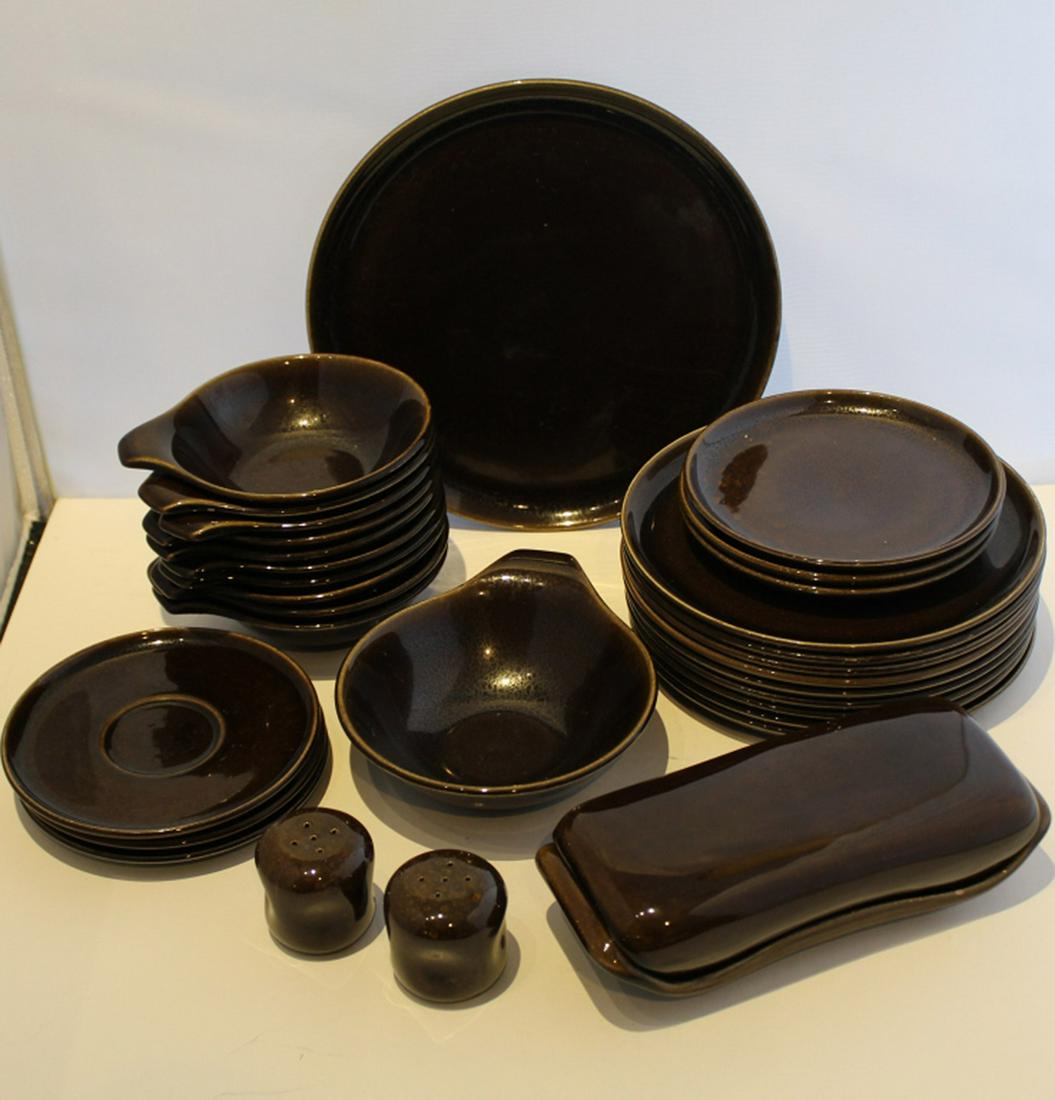 Vintage Russel Wright Chutney American Modern: Includes 1 dinner plate, 9 salad plates, 3 bread plates, 3 saucers, 10 small lug bowls, 1 large lug bowl, salt & pepper shakers, and lidded butter dish (6 small chips and glaze flake chips to base edg