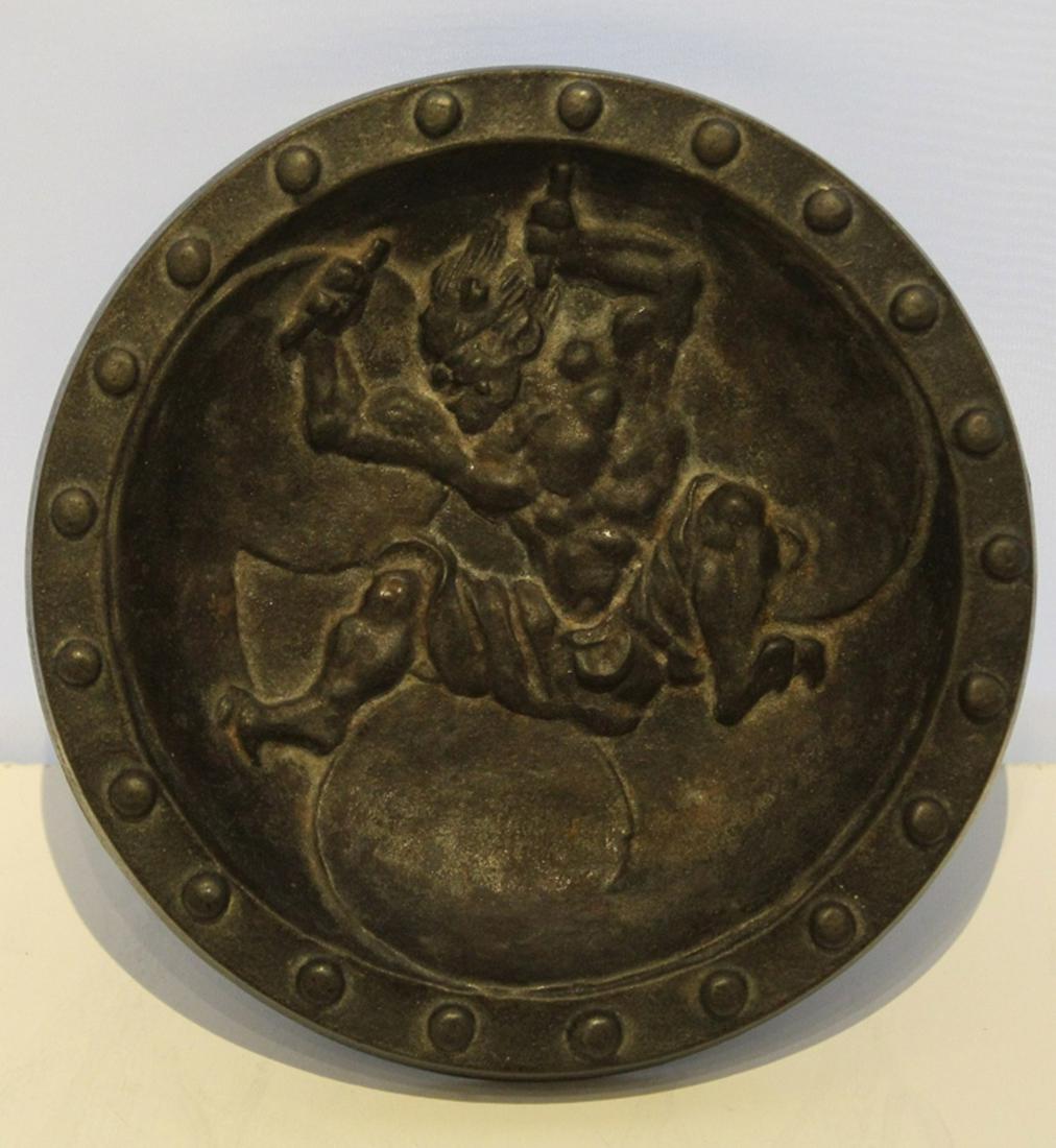 Vintage Japanese Cast Iron Raijin God Bowl: Heavy cast iron with raised figure of Raijin and stylized cloud swirls. No apparent maker's marks. Excellent condition with aged patina. 6.75" dia.