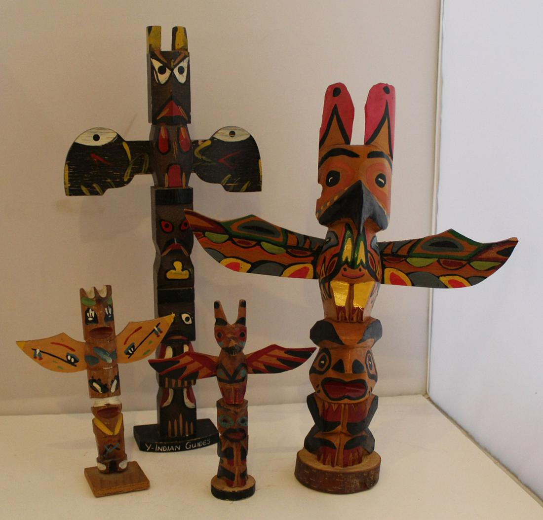 Vintage Souvenir Northwest Coast Style Totem Poles: Group of 4 carved wood and painted poles. Circa 1950's/ 60's. 14.5", 12.5", 6.25", and 6.25" heights approx.
