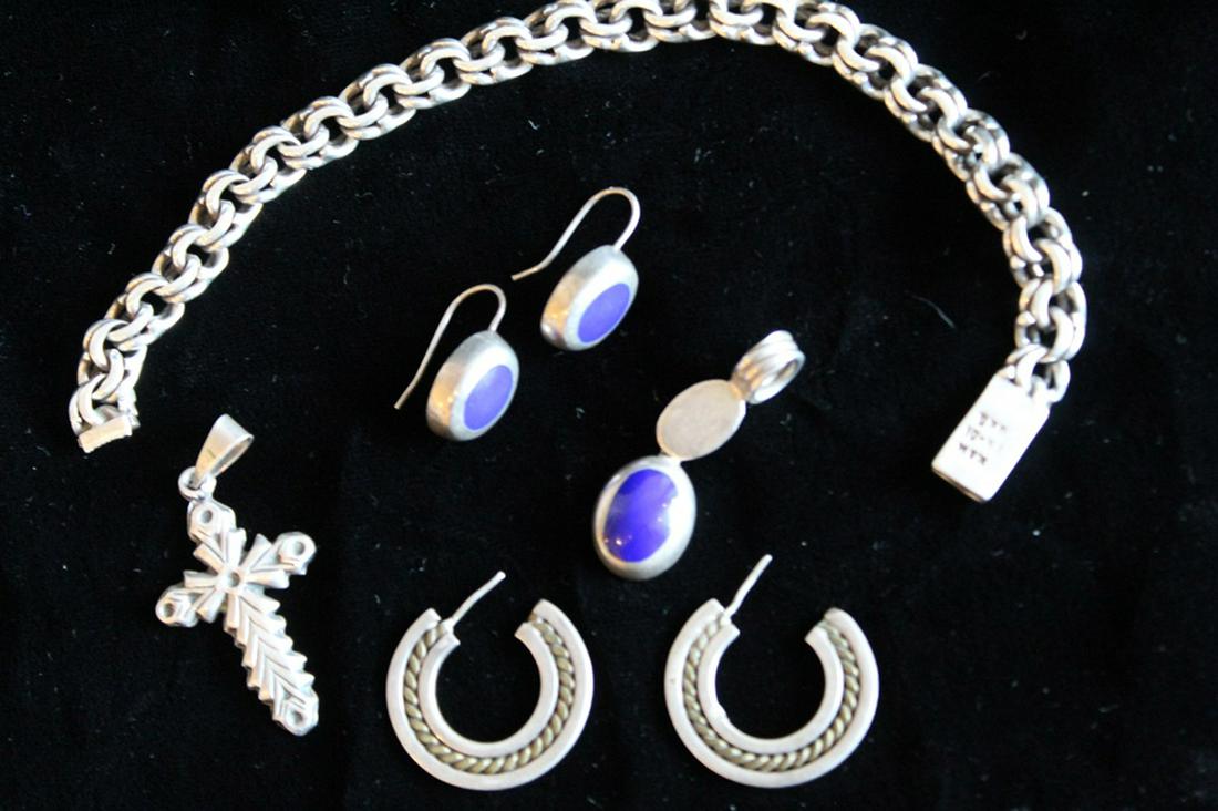 Vintage Mexico Sterling Jewelry: (1) Sterling pendant and earring set with polished inset blue lapis stone. 14 total grams approx. (2) Cross pendant marked Mexico 925 TV-55 (1 1/2" x 7/8"). 4 grams approx. (3) Earring set with brass 