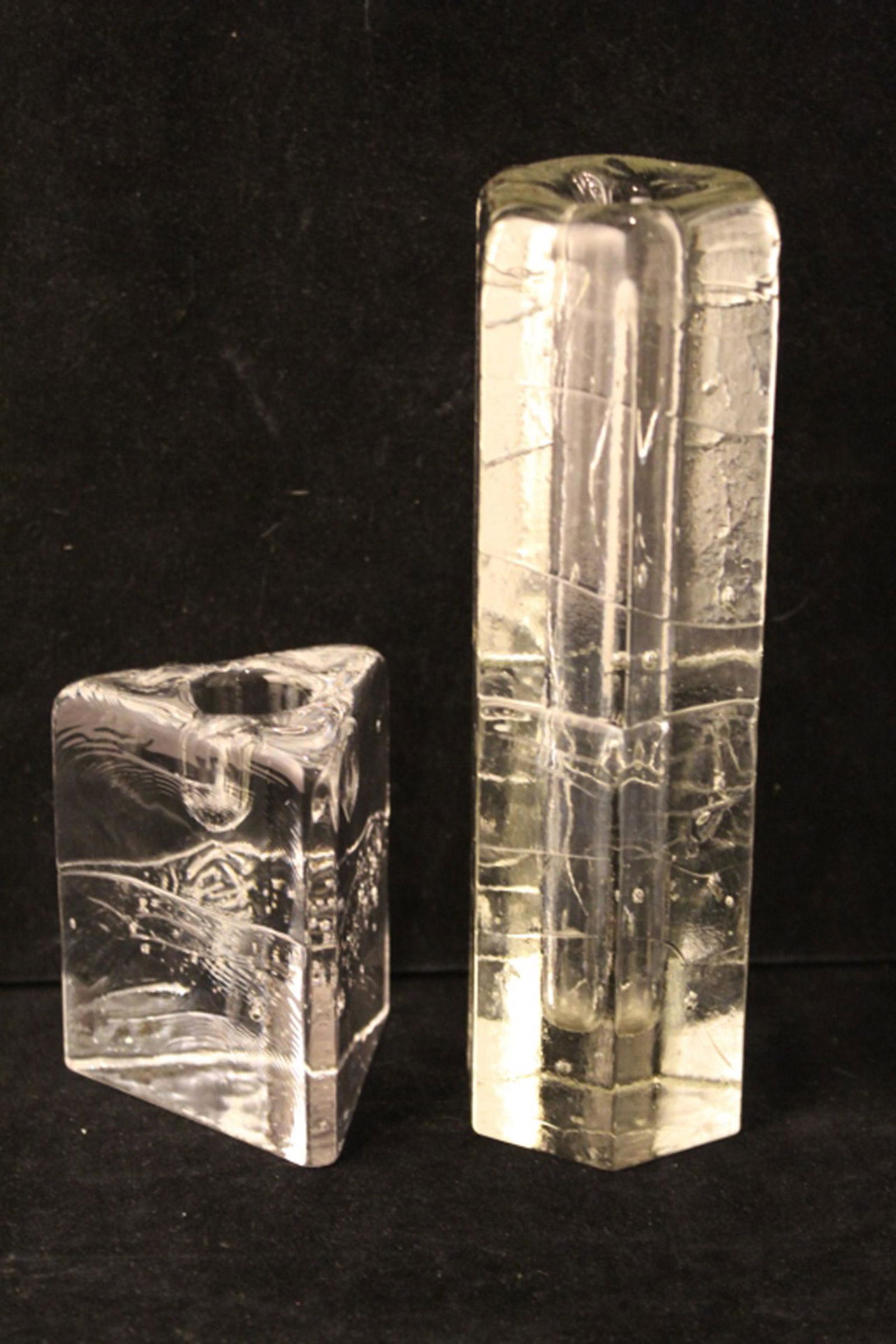 Timo Sarpaneva Iittala Candleholders: Group of two Scandinavian glass candleholders. In good condition. Dimension tall candleholder 2 1/4"diameter x 7"H.