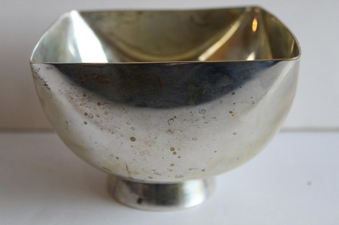 Vintage Ward Bennett Silverplate Bowl: Impressed "Ward Bennett Design" mark to bottom. Small oxidation spot to interior. 3" H x 4.25" x 4.25".