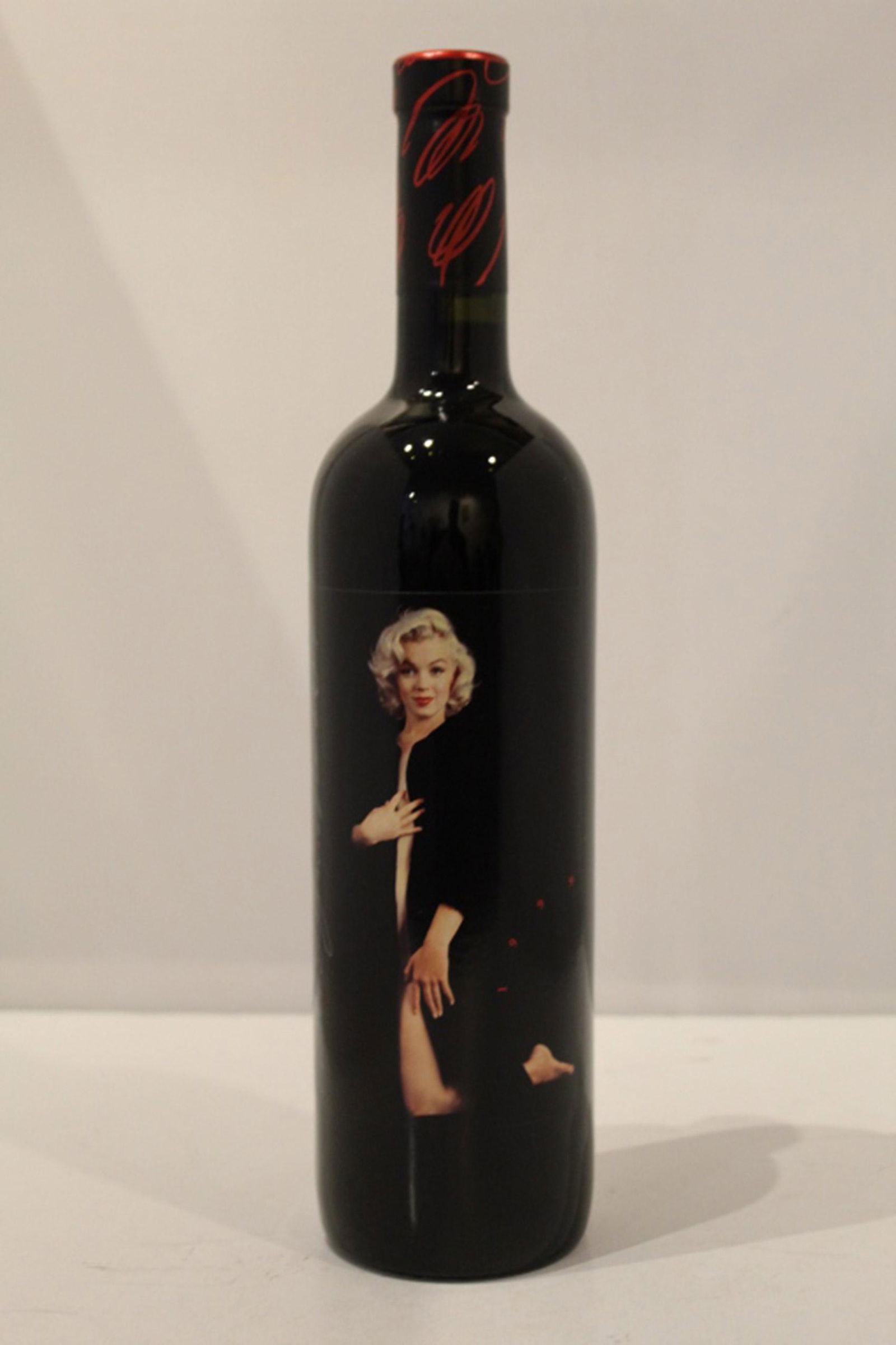 Marilyn Merlot - 1999 Napa Valley Merlot: Sealed 750 ML Bottle of 1999 Marilyn Merlot. Stored in a climate controlled setting. Cork, seal and lable all appear in perfect unused condition. We can assume no liabilty during shipping due to possi