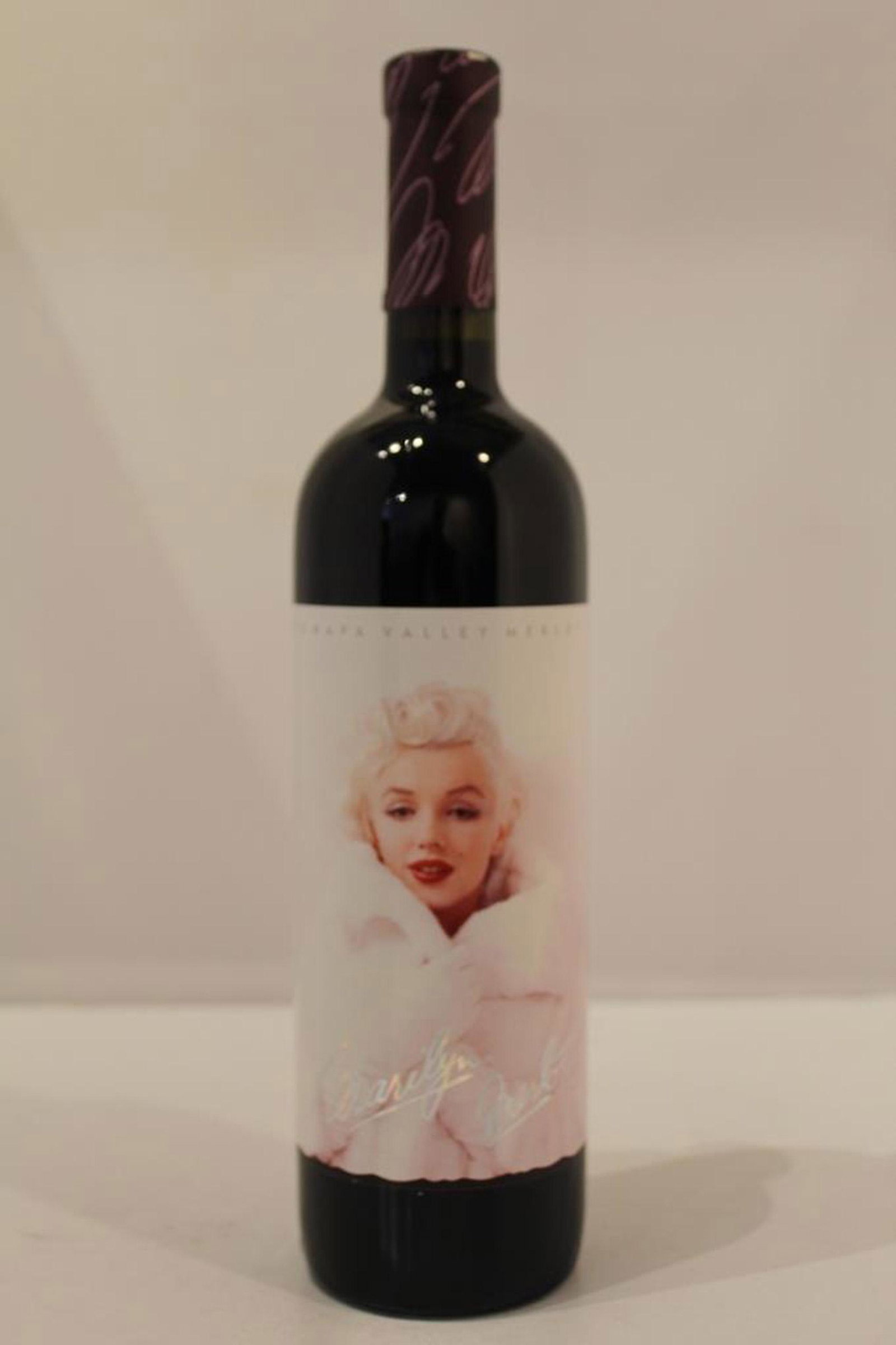 Marilyn Merlot - 1995 Napa Valley Merlot: Sealed 750 ML Bottle of 1995 Marilyn Merlot. Stored in a climate controlled setting.Cork, seal and label all appear in perfect unused condition. We can assume no liabilty due to possible temperature f