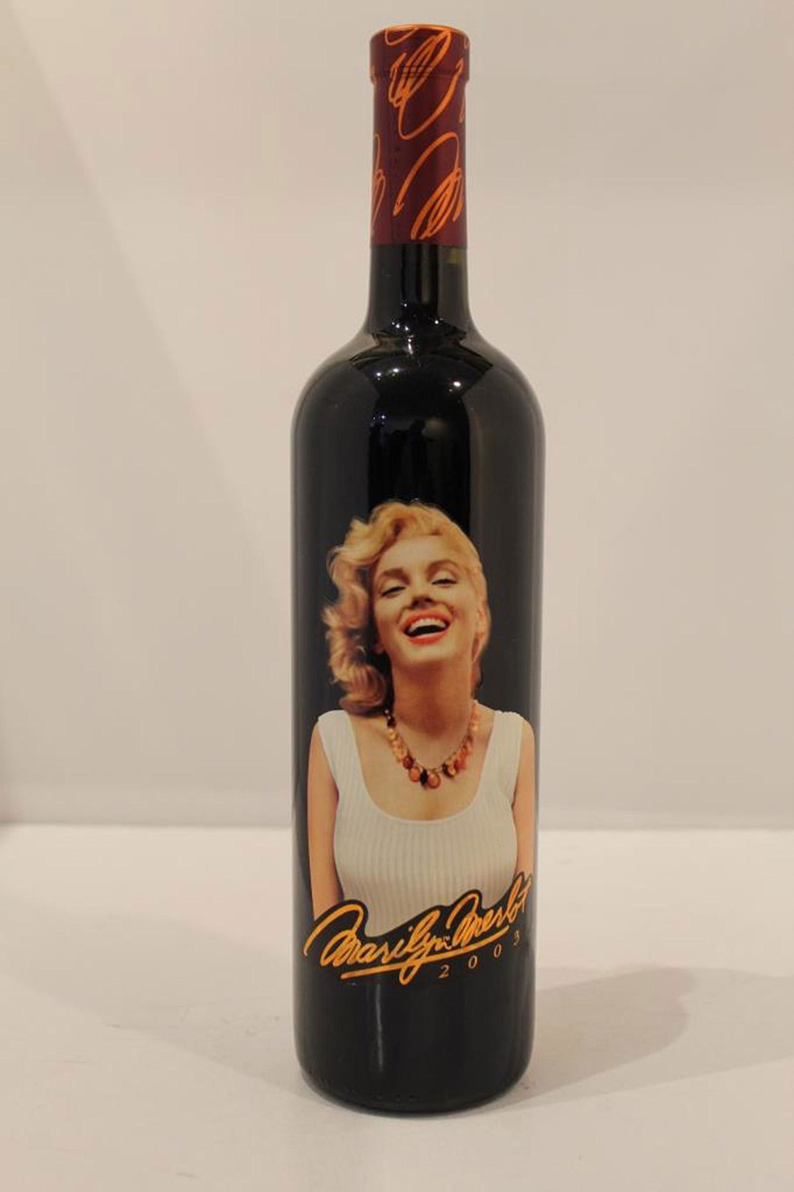 Marilyn Merlot - 2003 Napa Valley Merlot: Sealed 750 ML Bottle of 2003 Marilyn Merlot. Stored in a climate controlled setting. Cork, seal and lable all appear in perfect unused condition. We can assume no liabilty during shipping due to possi