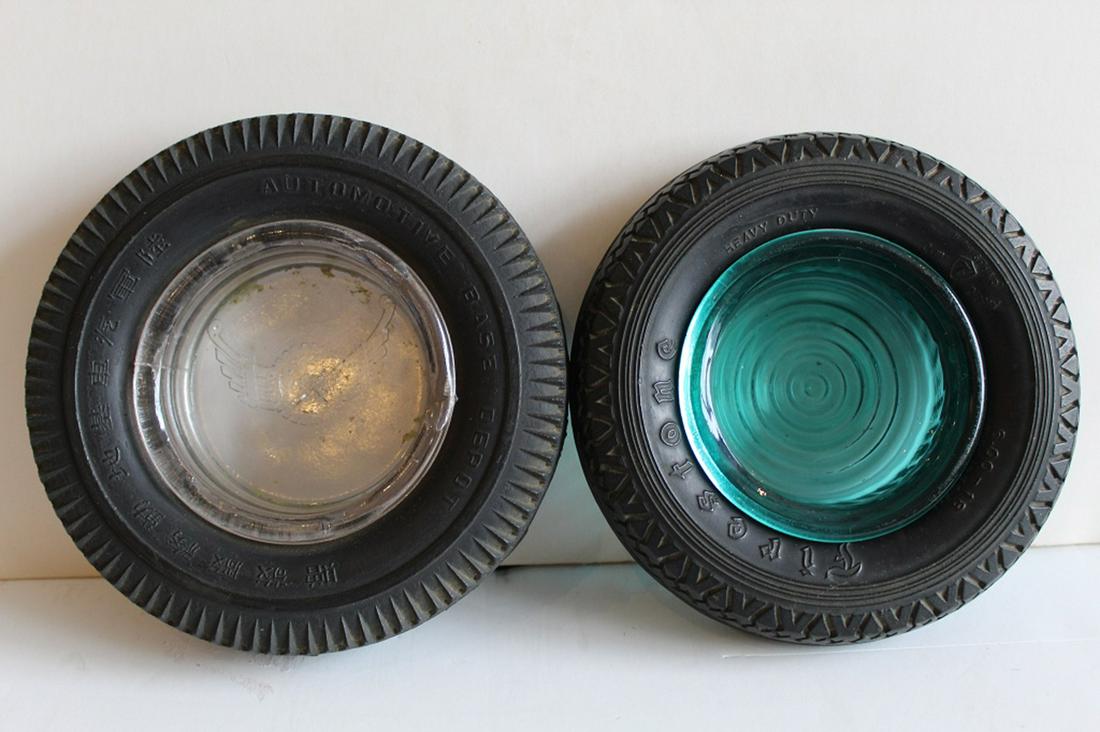 Two VIntage Rubber Tire Manufacturer Ashtrays: Two vintage adverstising rubber tire ashtrays: Firestone and Automotive Base Depot. Both in good condition. Dimension 6" diameter.