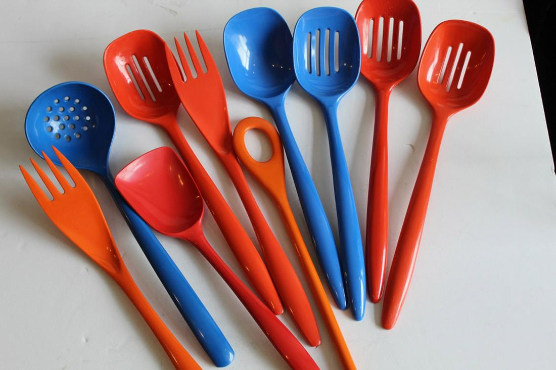 Vintage Rosti Denmark Kitchen Utensils: 8 pieces marked Rosti; slotted spoons, ladle spoon, fork, spoon, and pasta wand. Lot also includes Copco blue straining ladle and unmarked orange fork. All very good condition.10 pieces total.