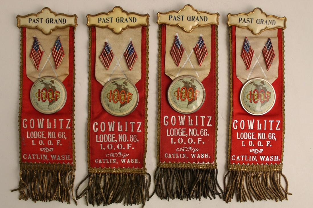 Antique Odd Fellows Silk Ribbon Badges / Pins: Group of 4. Metal pins (1892 patent dates) with celluloid insets "PAST GRAND". Cowlitz Lodge, No. 66, 1.0.0. F., Caitlin, Wash. Reversible silk ribbon. Red side with flags and metal button with "100 F