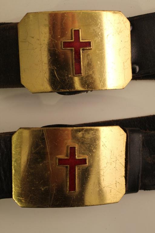Pair Odd Fellows Henderson Ames Brass Enamel Belts: Pair of Odd Fellow leather belts with Henderson Ames brass and enameled red cross buckles. In good vintage condition. Dimension buckle 2 1/8"W x 3 1/8"L.