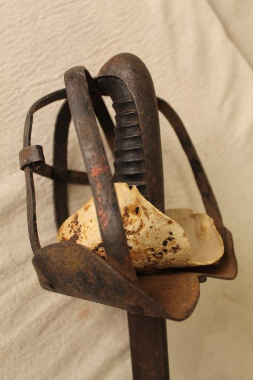 Pettibone Odd Fellows Ceremonial Short Sword: 19th Century Pettibone Co Odd Fellows ceremonial short sword with cage grip. Rust and wear to blade and grip. Dimension 5 1/2"W x 26"L.